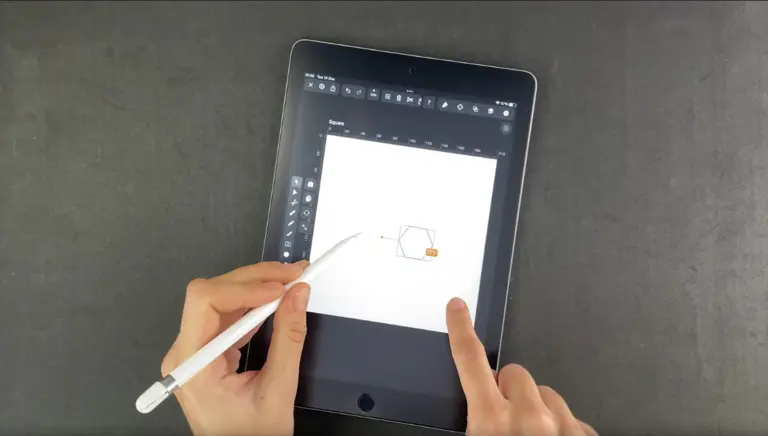 Drawing geometric shape on a tablet with a stylus and finger touch