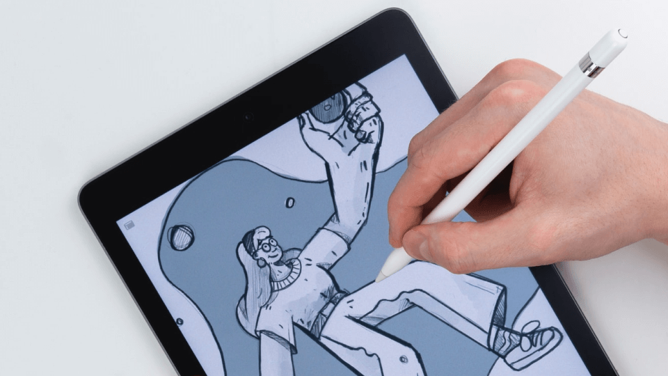 A person is drawing on a tablet.