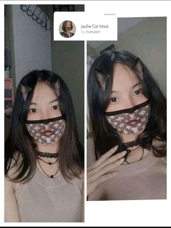  A girl with an augmented reality cat mask and patterned face mask, using a social media filter.